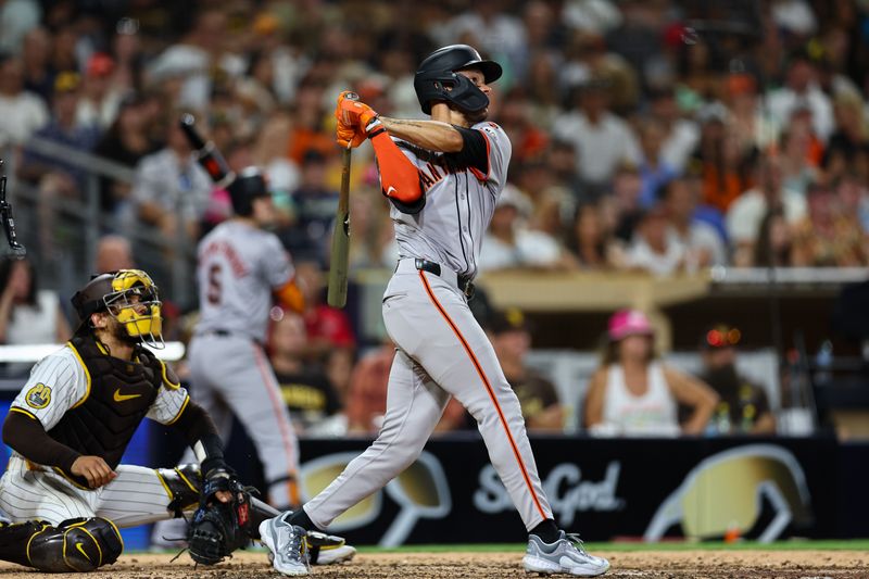 Sep 7, 2024; San Diego, California, USA; San Francisco Giants center fielder Grant McCray (58) hits a two run home run against the San Diego Padres during the ninth inning at Petco Park. Mandatory Credit: Chadd Cady-Imagn Images