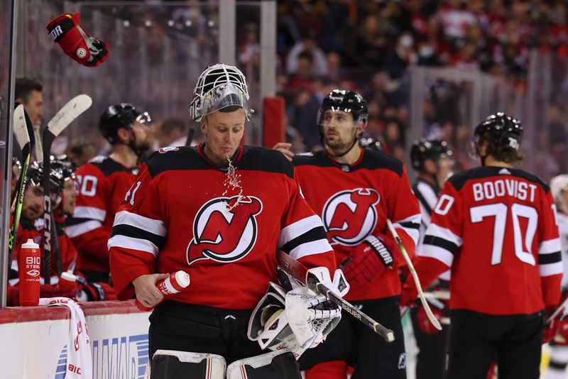 Feb 23, 2023; Newark, New Jersey, USA; New Jersey Devils goaltender Vitek Vanecek (41) during a break in the third period against the Los Angeles Kings at Prudential Center. Mandatory Credit: Ed Mulholland-USA TODAY Sports