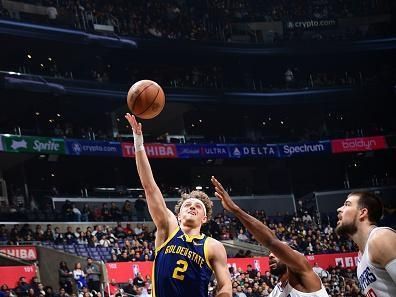 LOS ANGELES, CA - DECEMBER 14: Brandin Podziemski #2 of the Golden State Warriors drives to the basket during the game against the LA Clippers on December 14, 2023 at Crypto.Com Arena in Los Angeles, California. NOTE TO USER: User expressly acknowledges and agrees that, by downloading and/or using this Photograph, user is consenting to the terms and conditions of the Getty Images License Agreement. Mandatory Copyright Notice: Copyright 2023 NBAE (Photo by Adam Pantozzi/NBAE via Getty Images)