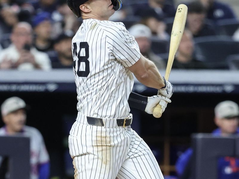May 18, 2025; Bronx, New York, USA;  New York Yankees first baseman Paul Goldschmidt (48) hits an RBI single in the eighth inning against the New York Mets at Yankee Stadium. Mandatory Credit: Wendell Cruz-Imagn Images