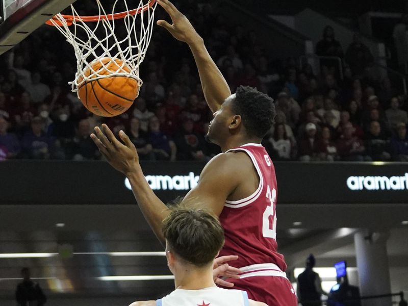 Feb 15, 2023; Evanston, Illinois, USA; Indiana Hoosiers forward Jordan Geronimo (22) dunks the ball against the Northwestern Wildcats during the first half at Welsh-Ryan Arena. Mandatory Credit: David Banks-USA TODAY Sports