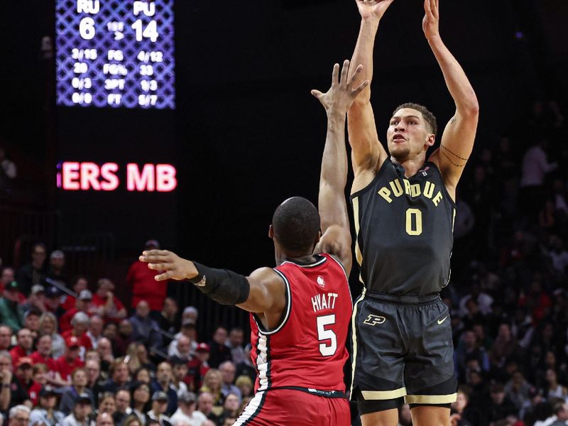 Jan 28, 2024; Piscataway, New Jersey, USA; Purdue Boilermakers forward Mason Gillis (0) shoots the ball asRutgers Scarlet Knights forward Aundre Hyatt (5) defends during the first half at Jersey Mike's Arena. Mandatory Credit: Vincent Carchietta-USA TODAY Sports