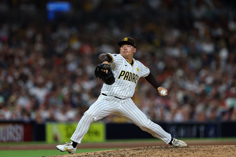 Sep 7, 2024; San Diego, California, USA; San Diego Padres relief pitcher Yuki Matsui (1) throws against the San Francisco Giants during the ninth inning at Petco Park. Mandatory Credit: Chadd Cady-Imagn Images