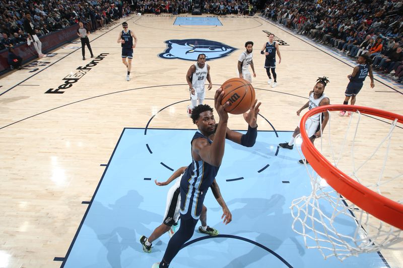 MEMPHIS, TN - FEBRUARY 3:  Jaren Jackson Jr. #13 of the Memphis Grizzlies shoots the ball during the game against the San Antonio Spurs on February 3, 2025 at FedExForum in Memphis, Tennessee. NOTE TO USER: User expressly acknowledges and agrees that, by downloading and or using this photograph, User is consenting to the terms and conditions of the Getty Images License Agreement. Mandatory Copyright Notice: Copyright 2025 NBAE (Photo by Joe Murphy/NBAE via Getty Images)