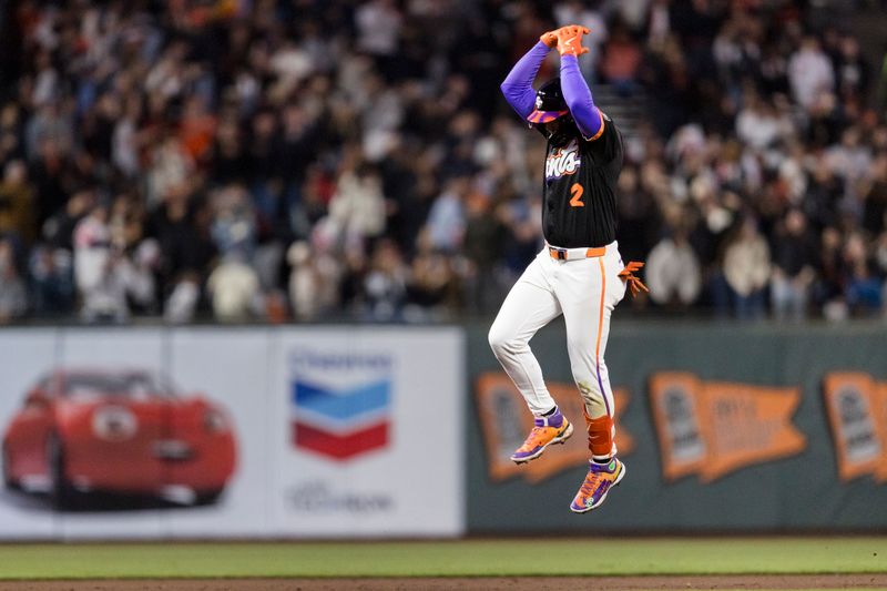 May 13, 2025; San Francisco, California, USA; San Francisco Giants shortstop Willy Adames (2) gestures as he runs the bases after hitting a two-run home run against the Arizona Diamondbacks during the fifth inning at Oracle Park. Mandatory Credit: John Hefti-Imagn Images