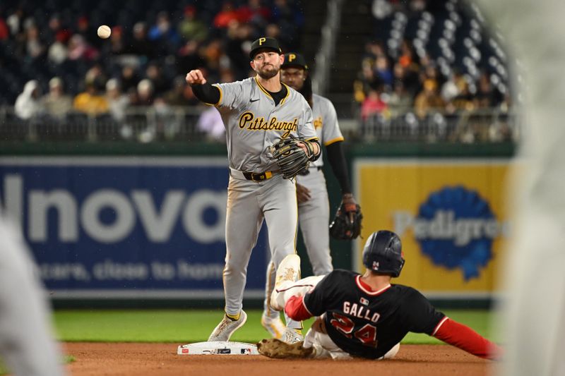 Apr 3, 2024; Washington, District of Columbia, USA; Pittsburgh Pirates third baseman Jared Triolo (19) throws to first base after getting Washington Nationals first baseman Joey Gallo (24) out at second base during the seventh inning at Nationals Park. Mandatory Credit: Rafael Suanes-USA TODAY Sports