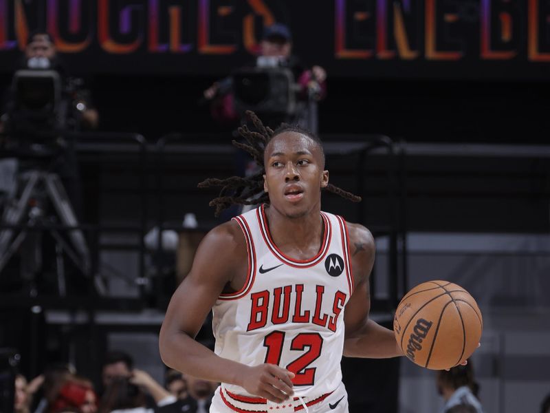 SACRAMENTO, CA - MARCH 4:  Ayo Dosunmu #12 of the Chicago Bulls handles the ball during the game against the Sacramento Kings on March 4, 2024 at Golden 1 Center in Sacramento, California. NOTE TO USER: User expressly acknowledges and agrees that, by downloading and or using this Photograph, user is consenting to the terms and conditions of the Getty Images License Agreement. Mandatory Copyright Notice: Copyright 2024 NBAE (Photo by Rocky Widner/NBAE via Getty Images)