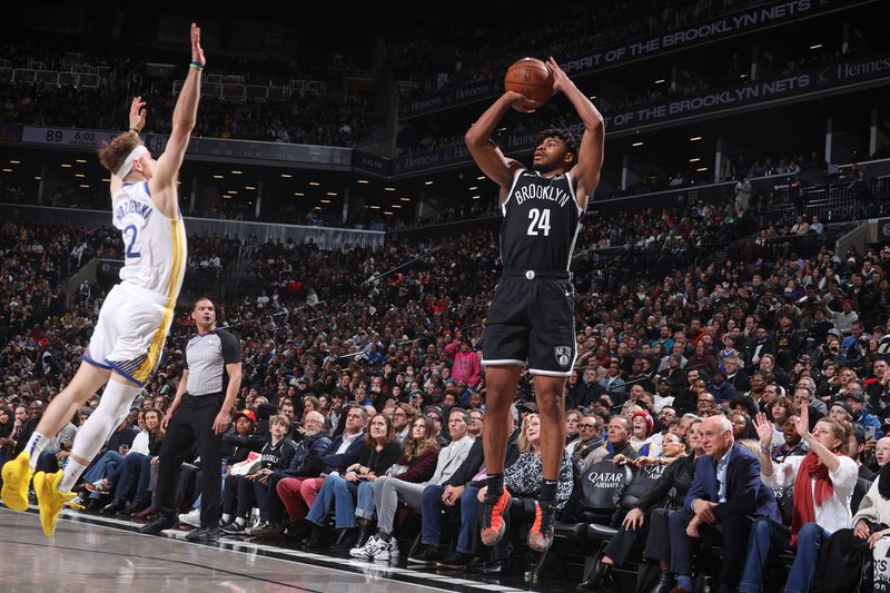 BROOKLYN, NY - FEBRUARY 5: Cam Thomas #24 of the Brooklyn Nets shoots a three point basket during the game against the Golden State Warriors on February 5, 2024 at Barclays Center in Brooklyn, New York. NOTE TO USER: User expressly acknowledges and agrees that, by downloading and or using this Photograph, user is consenting to the terms and conditions of the Getty Images License Agreement. Mandatory Copyright Notice: Copyright 2024 NBAE (Photo by Nathaniel S. Butler/NBAE via Getty Images)