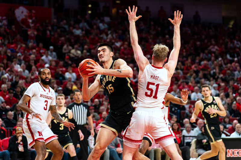 Jan 9, 2024; Lincoln, Nebraska, USA; Purdue Boilermakers center Zach Edey (15) drives against Nebraska Cornhuskers forward Rienk Mast (51) during the second half at Pinnacle Bank Arena. Mandatory Credit: Dylan Widger-USA TODAY Sports