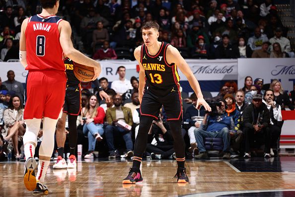 WASHINGTON, DC -? DECEMBER 31: Bogdan Bogdanovic #13 of the Atlanta Hawks plays defense during the game against the Washington Wizards on December 31, 2023 at Capital One Arena in Washington, DC. NOTE TO USER: User expressly acknowledges and agrees that, by downloading and or using this Photograph, user is consenting to the terms and conditions of the Getty Images License Agreement. Mandatory Copyright Notice: Copyright 2023 NBAE (Photo by Kenny Giarla/NBAE via Getty Images)