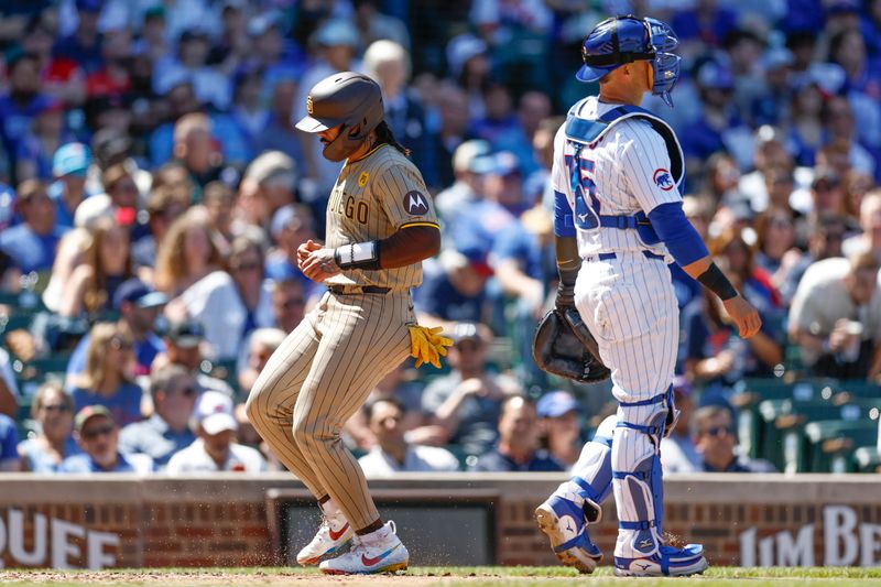 May 8, 2024; Chicago, Illinois, USA; San Diego Padres catcher Luis Campusano (12) scores against the Chicago Cubs during the fifth inning at Wrigley Field. Mandatory Credit: Kamil Krzaczynski-USA TODAY Sports