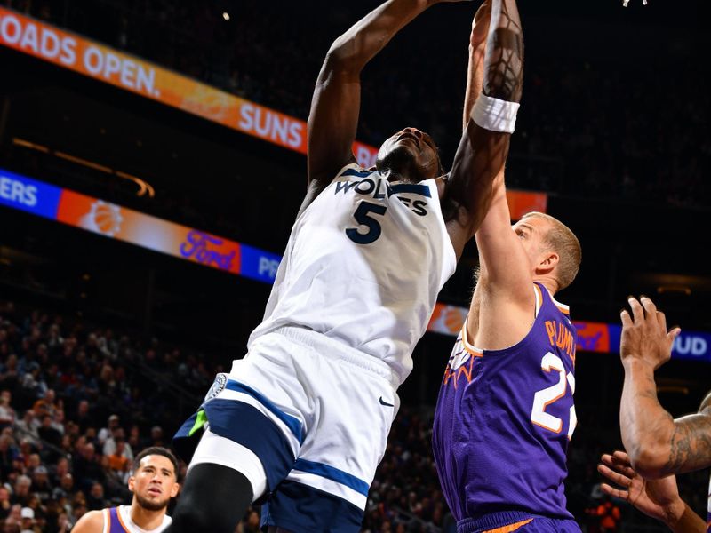 PHOENIX, AZ - JANUARY 29: Anthony Edwards #5 of the Minnesota Timberwolves drives to the basket during the game against the Phoenix Suns on January 29, 2025 at Footprint Center in Phoenix, Arizona. NOTE TO USER: User expressly acknowledges and agrees that, by downloading and or using this photograph, user is consenting to the terms and conditions of the Getty Images License Agreement. Mandatory Copyright Notice: Copyright 2025 NBAE (Photo by Barry Gossage/NBAE via Getty Images)