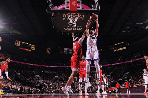 PORTLAND, OR - DECEMBER 26: Domantas Sabonis #10 of the Sacramento Kings drives to the basket during the game against the Portland Trail Blazers on December 26, 2023 at the Moda Center Arena in Portland, Oregon. NOTE TO USER: User expressly acknowledges and agrees that, by downloading and or using this photograph, user is consenting to the terms and conditions of the Getty Images License Agreement. Mandatory Copyright Notice: Copyright 2023 NBAE (Photo by Cameron Browne/NBAE via Getty Images)