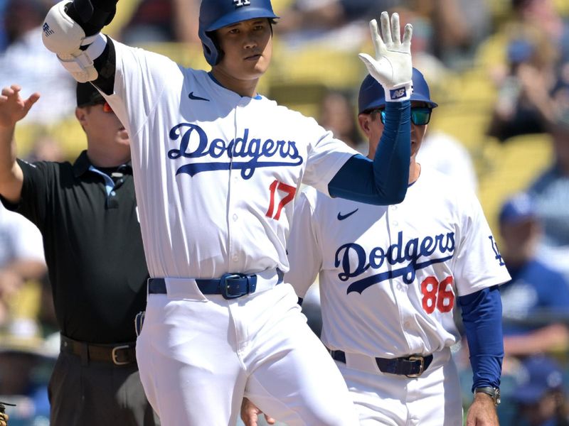 Apr 17, 2024; Los Angeles, California, USA; Los Angeles Dodgers designated hitter player Shohei Ohtani (17) gestures after hitting a single in the eighth inning against the Washington Nationals at Dodger Stadium. Mandatory Credit: Jayne Kamin-Oncea-USA TODAY Sports