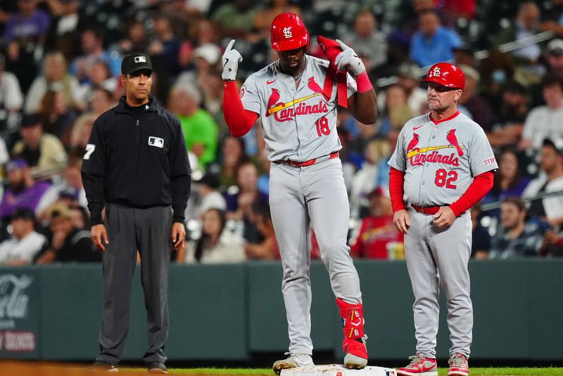 Sep 24, 2024; Denver, Colorado, USA; St. Louis Cardinals right fielder Jordan Walker (18) celebrates his RBI single in the eighth inning against the Colorado Rockies at Coors Field. Mandatory Credit: Ron Chenoy-Imagn Images