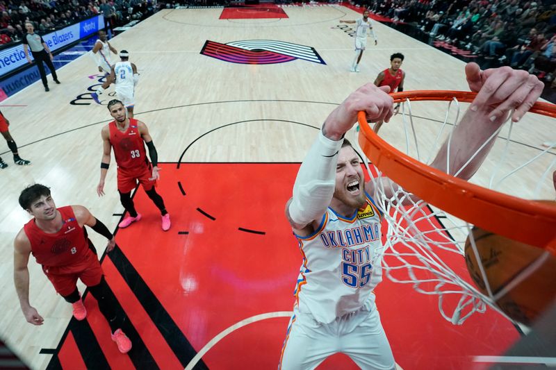 PORTLAND, OREGON - JANUARY 26: Isaiah Hartenstein #55 of the Oklahoma City Thunder dunks the ball during the second half against the Portland Trail Blazers at Moda Center on January 26, 2025 in Portland, Oregon. NOTE TO USER: User expressly acknowledges and agrees that, by downloading and or using this photograph, User is consenting to the terms and conditions of the Getty Images License Agreement. (Photo by Soobum Im/Getty Images)