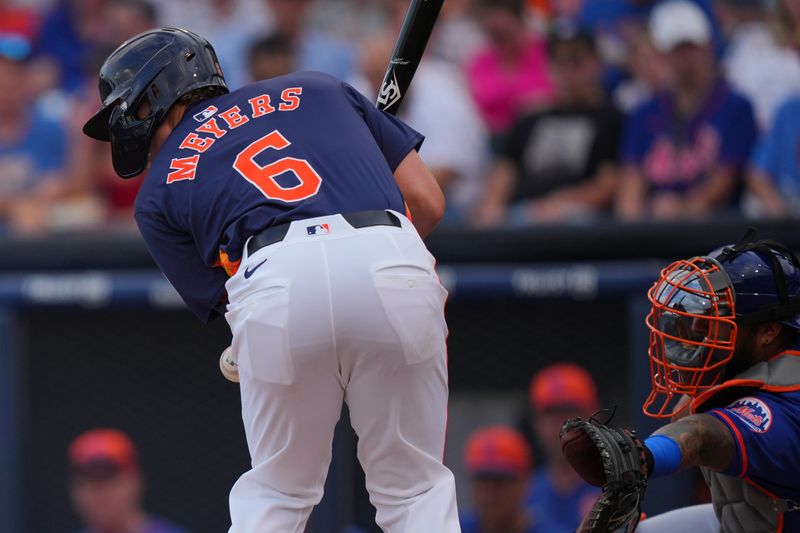 Mar 16, 2024; West Palm Beach, Florida, USA;  Houston Astros center fielder Jake Meyers (6) gets hit by a pitch in the first inning against the New York Mets at CACTI Park of the Palm Beaches. Mandatory Credit: Jim Rassol-USA TODAY Sports