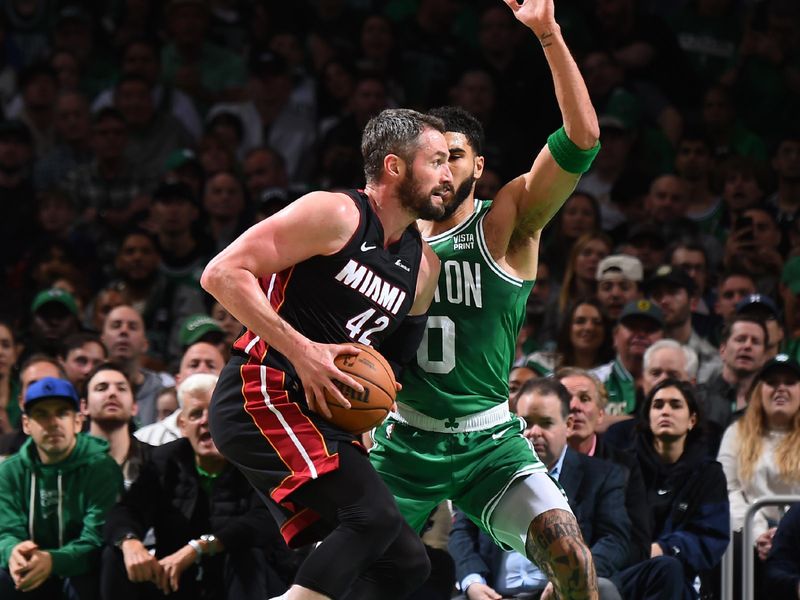 BOSTON, MA - APRIL 24: Jayson Tatum #0 of the Boston Celtics plays defense during the game  against Kevin Love #42 of the Miami Heat during Round 1 Game 2 of the 2024 NBA Playoffs on April 24, 2024 at the TD Garden in Boston, Massachusetts. NOTE TO USER: User expressly acknowledges and agrees that, by downloading and or using this photograph, User is consenting to the terms and conditions of the Getty Images License Agreement. Mandatory Copyright Notice: Copyright 2024 NBAE  (Photo by Brian Babineau/NBAE via Getty Images)