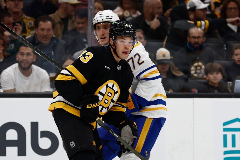 Oct 11, 2025; Boston, Massachusetts, USA; Boston Bruins defenseman Jordan Harris (43) stays close to Buffalo Sabres center Tage Thompson (72) during the second period at TD Garden. Mandatory Credit: Winslow Townson-Imagn Images