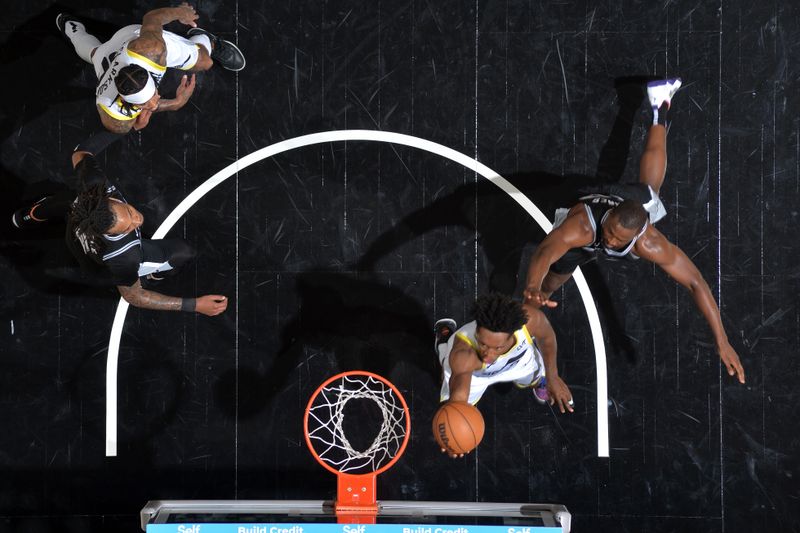 SAN ANTONIO, TX - NOVEMBER 9: Collin Sexton #2 of the Utah Jazz drives to the basket during the game against the San Antonio Spurs on November 9, 2024 at the Frost Bank Center in San Antonio, Texas. NOTE TO USER: User expressly acknowledges and agrees that, by downloading and or using this photograph, user is consenting to the terms and conditions of the Getty Images License Agreement. Mandatory Copyright Notice: Copyright 2024 NBAE (Photos by Michael Gonzales/NBAE via Getty Images)