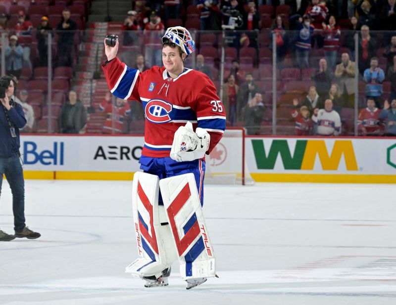 Nov 18, 2024; Montreal, Quebec, CAN;  Montreal Canadiens goalie Sam Montembeault (35) celebrates the win against the Edmonton Oilers at the Bell Centre. Mandatory Credit: Eric Bolte-Imagn Images