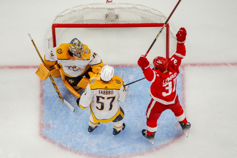 Dec 29, 2023; Detroit, Michigan, USA; Detroit Red Wings left wing J.T. Compher (37) celebrates a goal against Nashville Predators goaltender Juuse Saros (74) during the game between the Detroit Red Wings and the Nashville Predators at Little Caesars Arena. Mandatory Credit: Brian Bradshaw Sevald-USA TODAY Sports