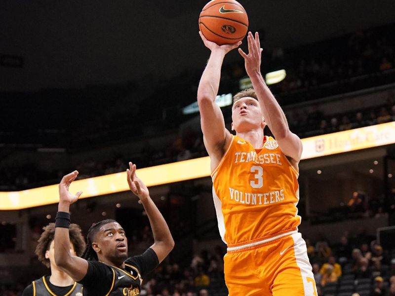 Feb 20, 2024; Columbia, Missouri, USA; Tennessee Volunteers guard Dalton Knecht (3) shoots as Missouri Tigers guard Sean East II (55) defends  during the second half at Mizzou Arena. Mandatory Credit: Denny Medley-USA TODAY Sports