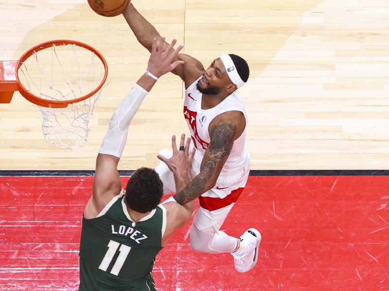 TORONTO, CANADA - JANUARY 6: Bruce Brown #11 of the Toronto Raptors drives to the basket during the game against the Milwaukee Bucks on January 6, 2025 at the Scotiabank Arena in Toronto, Ontario, Canada.  NOTE TO USER: User expressly acknowledges and agrees that, by downloading and or using this Photograph, user is consenting to the terms and conditions of the Getty Images License Agreement.  Mandatory Copyright Notice: Copyright 2025 NBAE (Photo by Vaughn Ridley/NBAE via Getty Images)