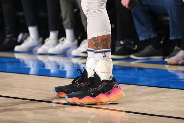 MILWAUKEE, WI - DECEMBER 2: The sneakers of Trae Young #11 of the Atlanta Hawks during the game against the Milwaukee Bucks on December 2, 2023 at the Fiserv Forum Center in Milwaukee, Wisconsin. NOTE TO USER: User expressly acknowledges and agrees that, by downloading and or using this Photograph, user is consenting to the terms and conditions of the Getty Images License Agreement. Mandatory Copyright Notice: Copyright 2023 NBAE (Photo by Gary Dineen/NBAE via Getty Images).