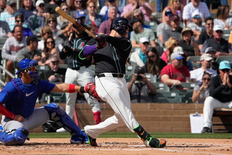 Mar 8, 2024; Salt River Pima-Maricopa, Arizona, USA; Arizona Diamondbacks left fielder Joc Pederson (3) hits against the Chicago Cubs in the first inning at Salt River Fields at Talking Stick. Mandatory Credit: Rick Scuteri-USA TODAY Sports