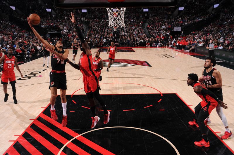 PORTLAND, OR - APRIL 12: Rayan Rupert #72 of the Portland Trail Blazers drives to the basket during the game against the Houston Rockets on April 12, 2024 at the Moda Center Arena in Portland, Oregon. NOTE TO USER: User expressly acknowledges and agrees that, by downloading and or using this photograph, user is consenting to the terms and conditions of the Getty Images License Agreement. Mandatory Copyright Notice: Copyright 2024 NBAE (Photo by Cameron Browne/NBAE via Getty Images)