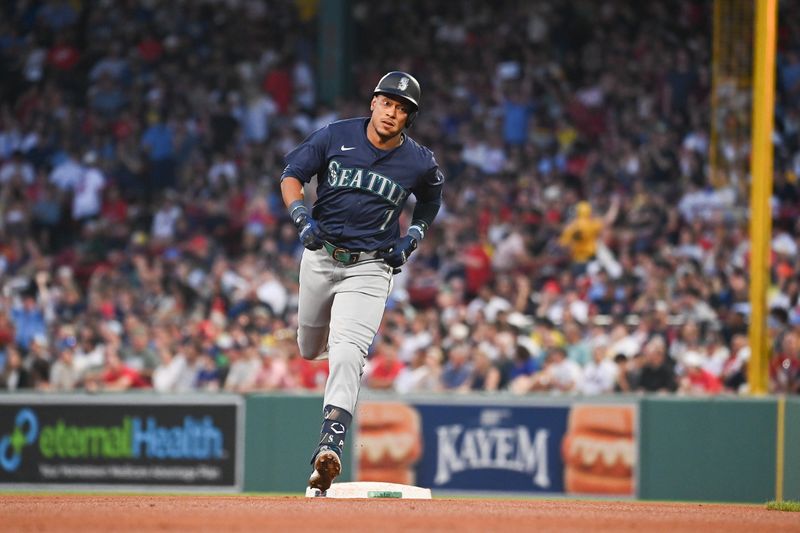 Jul 30, 2024; Boston, Massachusetts, USA; Seattle Mariners second baseman Jorge Polanco (7) runs the bases after hitting a home run against the Boston Red Sox during the fourth inning at Fenway Park. Mandatory Credit: Eric Canha-USA TODAY Sports