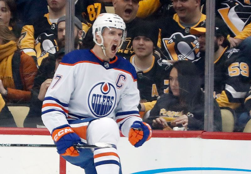 Feb 23, 2023; Pittsburgh, Pennsylvania, USA; Edmonton Oilers center Connor McDavid (97) reacts after scoring a goal against the Pittsburgh Penguins during the first period at PPG Paints Arena. Mandatory Credit: Charles LeClaire-USA TODAY Sports