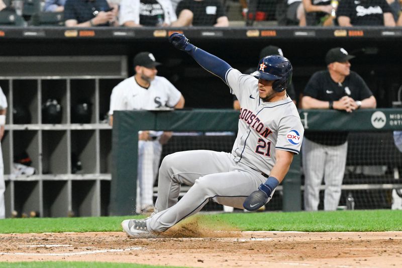 Jun 19, 2024; Chicago, Illinois, USA;  Houston Astros catcher Yainer Diaz (21) scores against the Chicago White Sox during the fourth inning at Guaranteed Rate Field. Mandatory Credit: Matt Marton-USA TODAY Sports