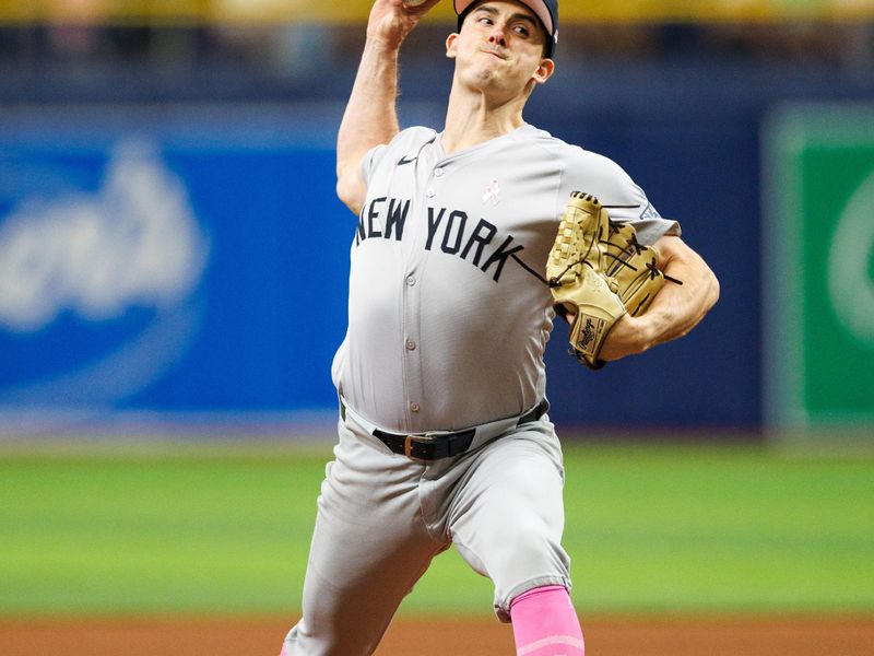 May 12, 2024; St. Petersburg, Florida, USA;  New York Yankees pitcher Nick Burdi (57) throws a pitch against the Tampa Bay Rays in the seventh inning at Tropicana Field. Mandatory Credit: Nathan Ray Seebeck-USA TODAY Sports