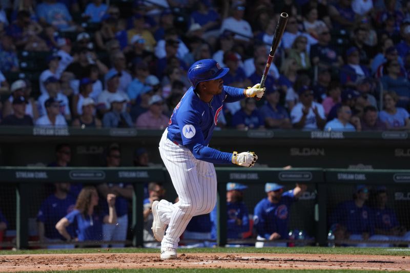 Feb 24, 2026; Mesa, Arizona, USA; Chicago Cubs third baseman BJ Murray (83) hits a single against the San Diego Padres in the second inning at Sloan Park. Mandatory Credit: Rick Scuteri-Imagn Images