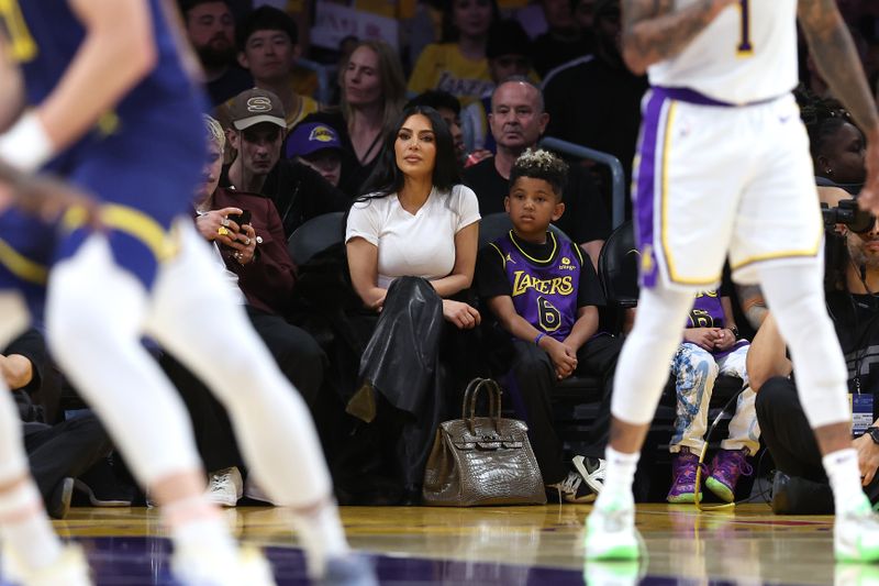 LOS ANGELES, CALIFORNIA - MARCH 16: Kim Kardashian looks on during the first half of a game between the Los Angeles Lakers and the Golden State Warriors at Crypto.com Arena on March 16, 2024 in Los Angeles, California. NOTE TO USER: User expressly acknowledges and agrees that, by downloading and or using this photograph, User is consenting to the terms and conditions of the Getty Images License Agreement. (Photo by Sean M. Haffey/Getty Images)