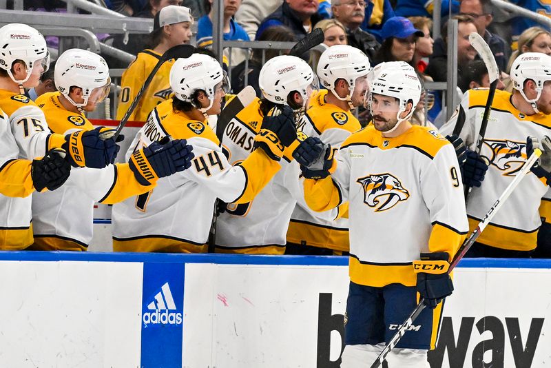 Nov 24, 2023; St. Louis, Missouri, USA;  Nashville Predators left wing Filip Forsberg (9) is congratulated by teammates after scoring against the St. Louis Blues during the second period at Enterprise Center. Mandatory Credit: Jeff Curry-USA TODAY Sports