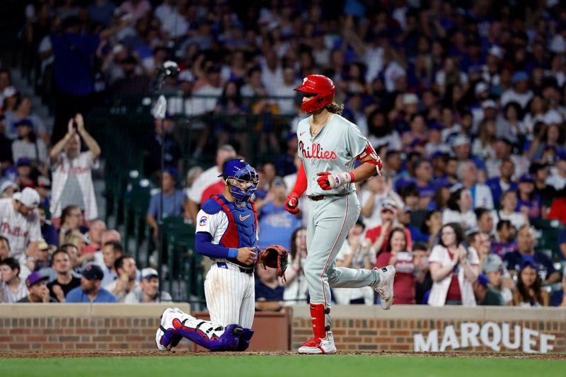 Jul 3, 2024; Chicago, Illinois, USA; Philadelphia Phillies third baseman Alec Bohm (28) crosses home plate after hitting a two-run home run against the Chicago Cubs during the sixth inning at Wrigley Field. Mandatory Credit: Kamil Krzaczynski-USA TODAY Sports