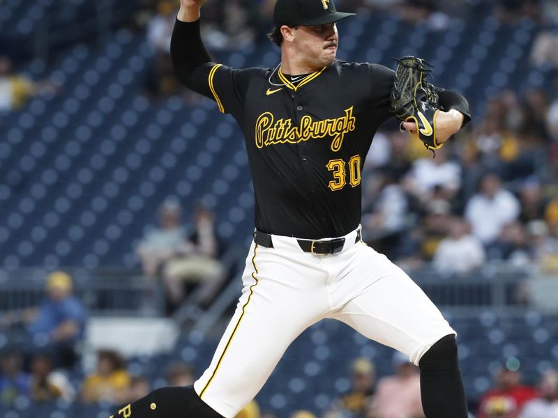 Jun 17, 2024; Pittsburgh, Pennsylvania, USA;  Pittsburgh Pirates starting pitcher Paul Skenes (30) delivers a pitch against the Cincinnati Reds during the first inning at PNC Park. Mandatory Credit: Charles LeClaire-USA TODAY Sports