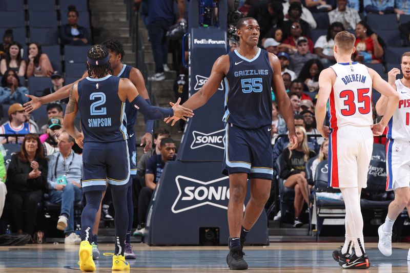 MEMPHIS, TN - APRIL 5: Zavier Simpson #2 of the Memphis Grizzlies high fives Trey Jemison #55 during the game against the Detroit Pistons on April 5, 2024 at FedExForum in Memphis, Tennessee. NOTE TO USER: User expressly acknowledges and agrees that, by downloading and or using this photograph, User is consenting to the terms and conditions of the Getty Images License Agreement. Mandatory Copyright Notice: Copyright 2024 NBAE (Photo by Joe Murphy/NBAE via Getty Images)