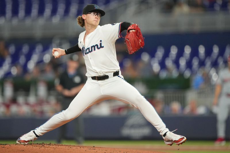 Aug 6, 2024; Miami, Florida, USA;  Miami Marlins starting pitcher Max Meyer (23) pitches against the Cincinnati Reds in the first inning at loanDepot Park. Mandatory Credit: Jim Rassol-USA TODAY Sports