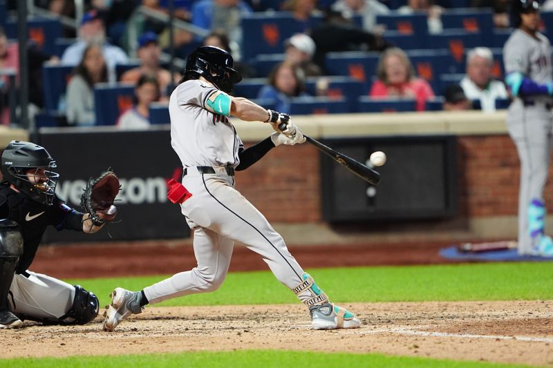 May 31, 2024; New York City, New York, USA; Arizona Diamondbacks center fielder Corbin Carroll (7) hits a single against the New York Mets during the fifth inning at Citi Field. Mandatory Credit: Gregory Fisher-USA TODAY Sports