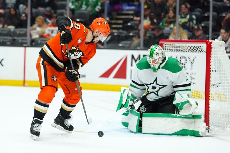 Dec 19, 2025; Anaheim, California, USA; Anaheim Ducks left wing Chris Kreider (20) shoots the puck against Dallas Stars goaltender Casey Desmith (1) in the second period at Honda Center. Mandatory Credit: Kirby Lee-Imagn Images