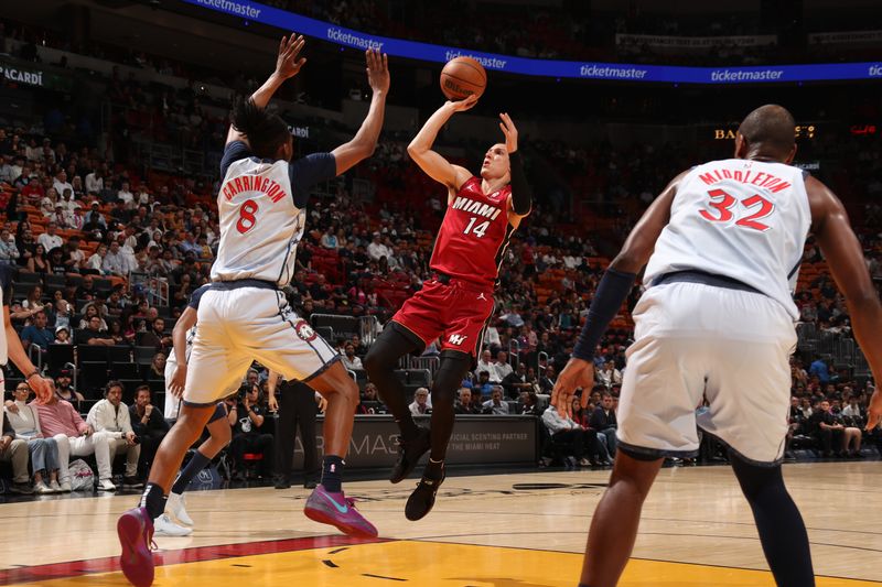 MIAMI, FL - MARCH 3: Tyler Herro #14 of the Miami Heat shoots the ball during the game against the Washington Wizards on March 3, 2025 at Kaseya Center in Miami, Florida. NOTE TO USER: User expressly acknowledges and agrees that, by downloading and or using this Photograph, user is consenting to the terms and conditions of the Getty Images License Agreement. Mandatory Copyright Notice: Copyright 2025 NBAE (Photo by Issac Baldizon/NBAE via Getty Images)