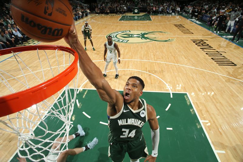 MILWAUKEE, WI - NOVEMBER 10: Giannis Antetokounmpo #34 of the Milwaukee Bucks dunks the ball during the game against the Boston Celtics on November 10, 2024 at the Fiserv Forum Center in Milwaukee, Wisconsin. NOTE TO USER: User expressly acknowledges and agrees that, by downloading and or using this Photograph, user is consenting to the terms and conditions of the Getty Images License Agreement. Mandatory Copyright Notice: Copyright 2024 NBAE (Photo by Gary Dineen/NBAE via Getty Images).