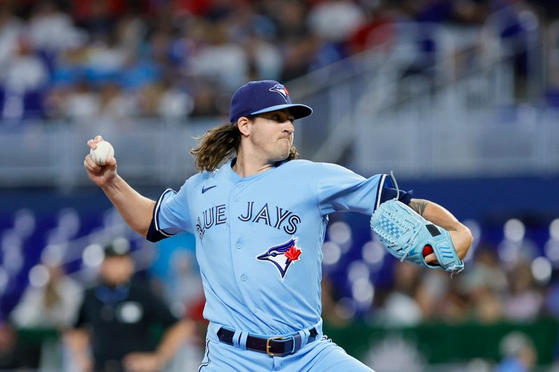 Jun 21, 2023; Miami, Florida, USA; Toronto Blue Jays starting pitcher Kevin Gausman (34) delivers a pitch against the Miami Marlins during the first inning at loanDepot Park. Mandatory Credit: Sam Navarro-USA TODAY Sports