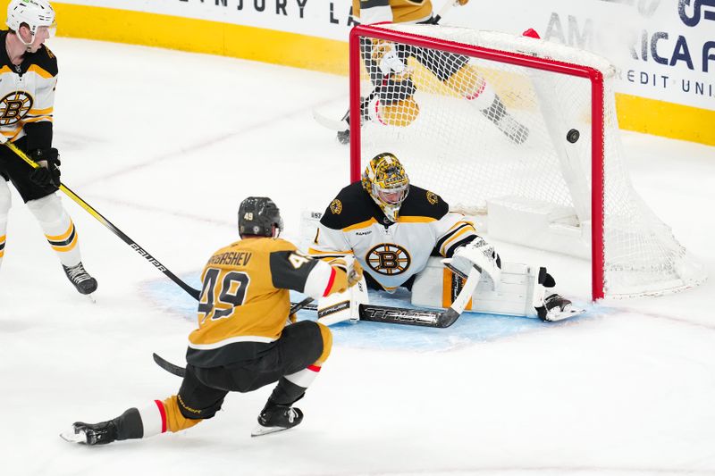 Mar 20, 2025; Las Vegas, Nevada, USA; Vegas Golden Knights center Ivan Barbashev (49) scores a goal against Boston Bruins goaltender Jeremy Swayman (1) during the third period at T-Mobile Arena. Mandatory Credit: Stephen R. Sylvanie-Imagn Images