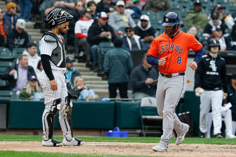 May 4, 2025; Chicago, Illinois, USA; Houston Astros first baseman Christian Walker (8) scores against the Chicago White Sox during the fifth inning at Rate Field. Mandatory Credit: Kamil Krzaczynski-Imagn Images