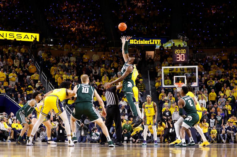 Feb 18, 2023; Ann Arbor, Michigan, USA;  Michigan State Spartans center Mady Sissoko (22) wins the tip off in the first half against the Michigan Wolverines at Crisler Center. Mandatory Credit: Rick Osentoski-USA TODAY Sports